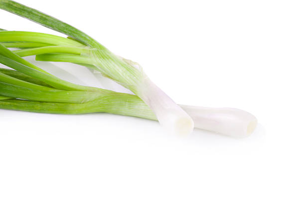 istock Green onion isolated on the white background 475044834