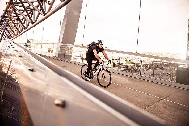 istock Commuter cycling fast at work in the morning 475045908