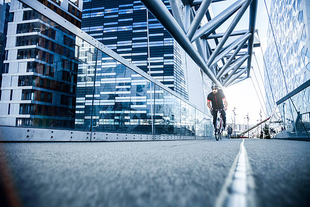 istock Commuter cycling fast at work in the morning 475045920