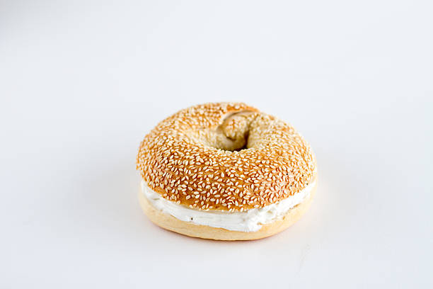 istock sesame seed bagel with cream cheese 475046088