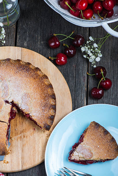 istock traditional homemade cherry pie served on rustic table 475046674