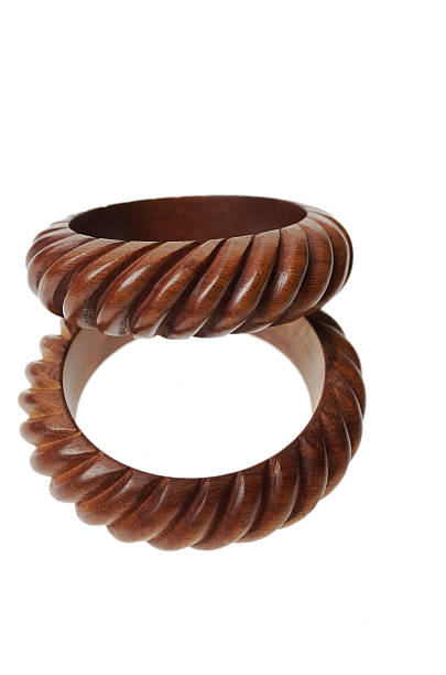 istock Handmade wood bracelets on white 475050214
