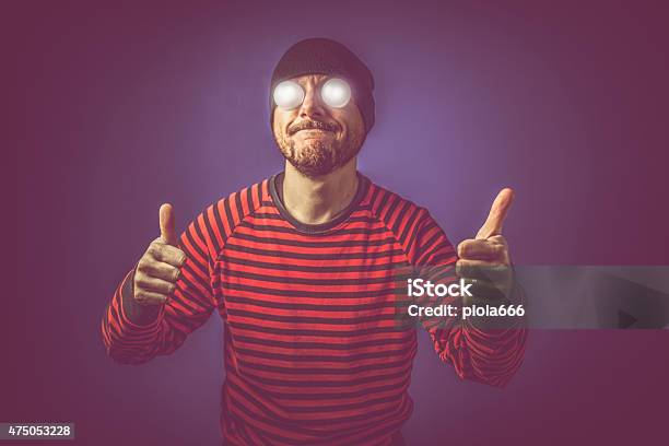 Man With Luminous Eyes Thumbs Up Stock Photo - Download Image Now - Eyesight, 2015, Adult