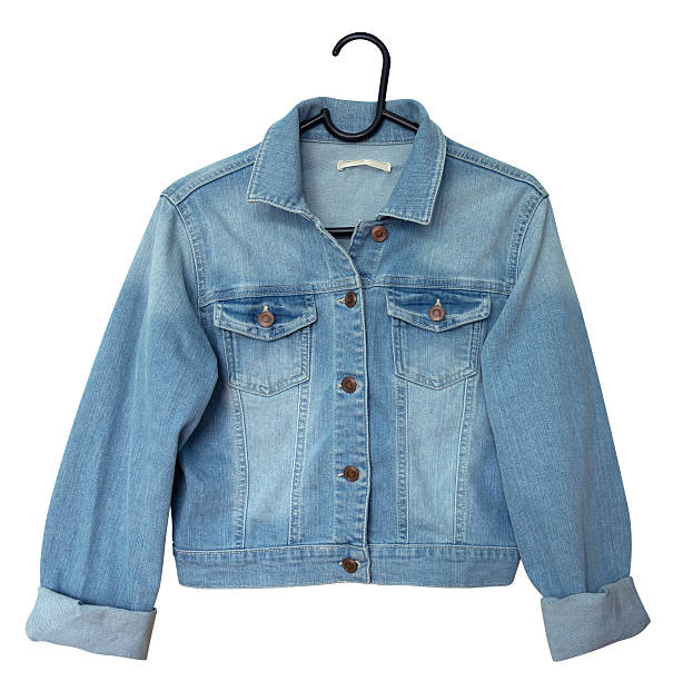 Denim jacket Denim jacket on a hanger. Isolated on white. Clipping path included. denim jacket stock pictures, royalty-free photos & images