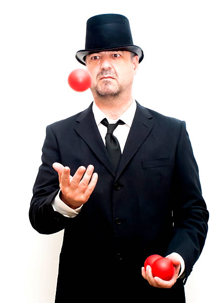 бизнесмен, жонглирование с красным мячей - juggling business businessman ball стоковые фото и изображения