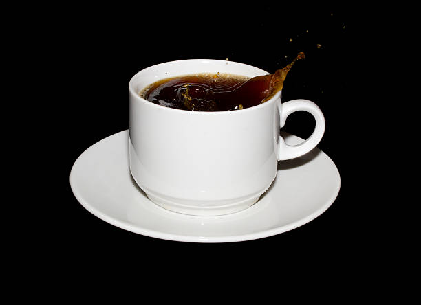 istock Sugar cube dropped into a cup of coffee 475055967