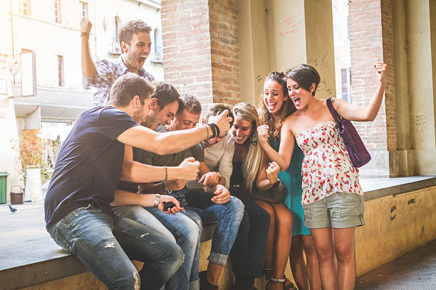 istock Group of friends watching sport on a digital tablet 475058164
