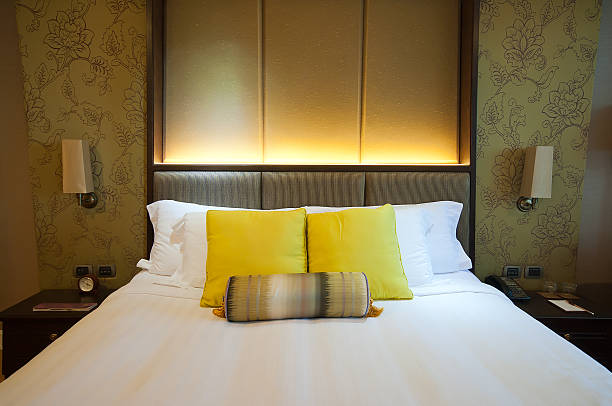 istock Bed in a hotel room 475058661
