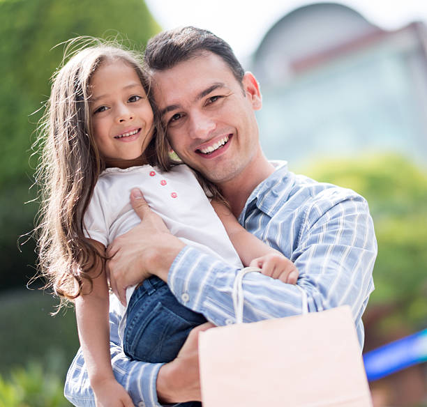 istock Father and daughter shopping 475060914