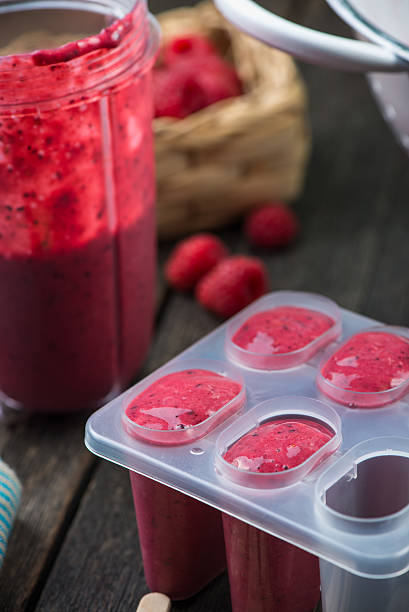 istock making homemade summer fruit lolly pops 475062124