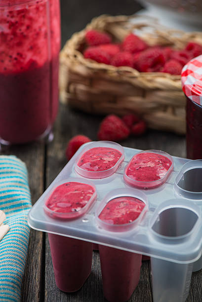 istock making homemade summer fruit lolly pops 475062134