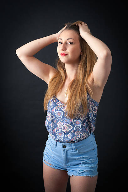 istock Beautiful girl doing different expressions in different sets of clothes 475062254