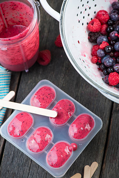 istock making homemade summer fruit lolly pops 475062752