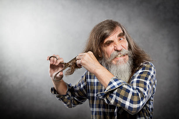 Old Man Scissors Cutting Hair, Senior Self Trim Long Hair Old Man Scissors Cutting Hair, Senior with Crazy Face Self Trim Long Hair angry hairstylist stock pictures, royalty-free photos & images