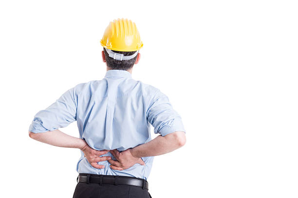 Engineer or architect feeling lower back pain stock photo