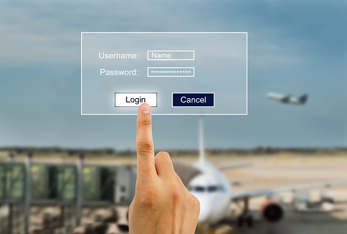 hand entering password to buying plane tickets online.All screen content is designed by us and not copyrighted by others and created with wacom tablet and ps