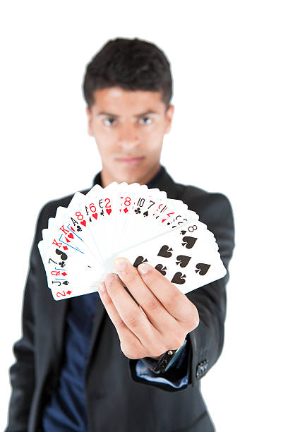 istock Man with poker cards 475064656
