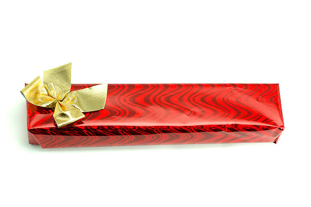 赤いギフト、ゴールドのリボン - isolated gift box wrapping paper celebration event ストックフォトと画像