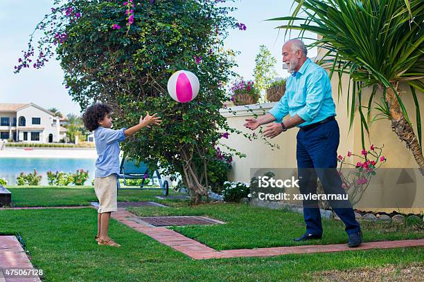 Playing With His Grandson Stock Photo - Download Image Now - Dubai, Family, Domestic Life