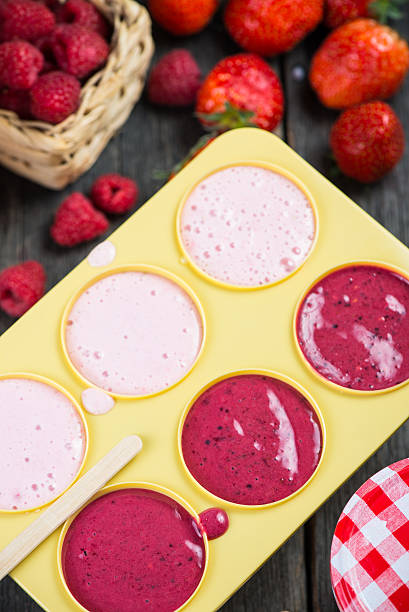 istock making homemade summer fruit lolly pops 475068442