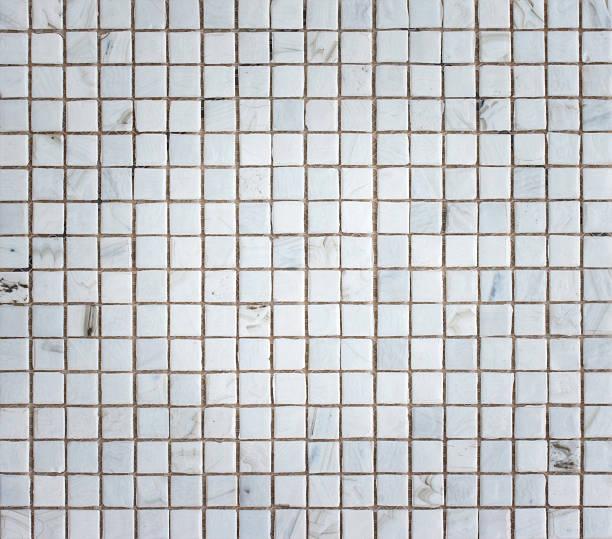 istock White Mosaic Tiles abstract texture and background 475069672