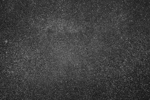 Photo of background texture of rough asphalt