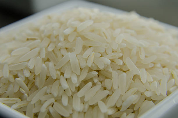 istock White Rice Close up In Bowl 475075576