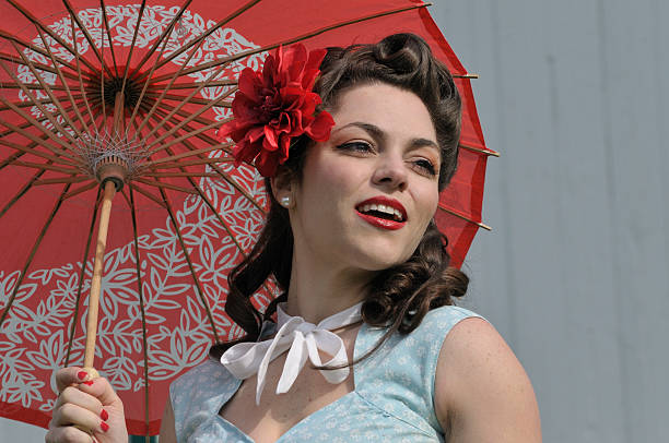 retro beauty portrait retro portrait of a classic beauty with red parasol umbrella 40s pin up girls stock pictures, royalty-free photos & images