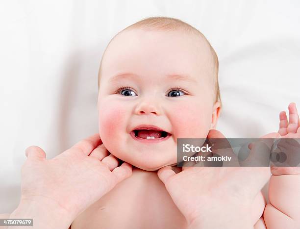 Mother Massaging Her Lovely Baby Stock Photo - Download Image Now - Baby - Human Age, Massaging, Adult