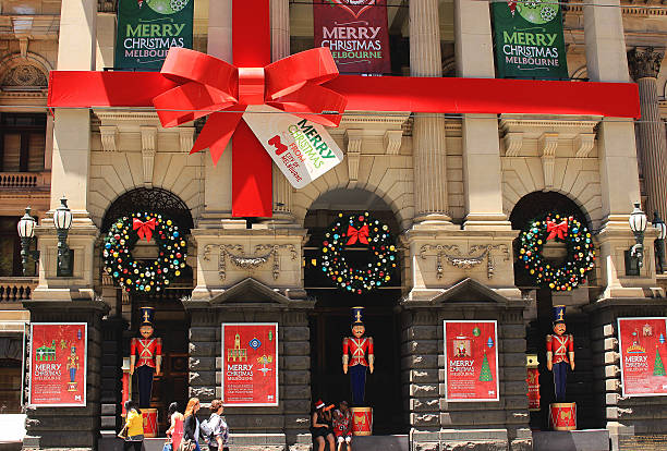 Melbourne, VIC, Australia - December 24, 2014: Melbourne Town Hall with Christmas decoration. Locals and tourists enjoying dining on Centre Place Melbourne CBD Australia.
