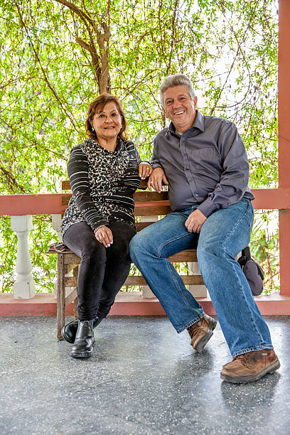istock Mature smiling couple in rural setting 475083230