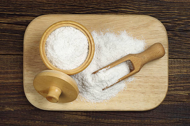 istock Salt in wooden bowl and scoop 475083490