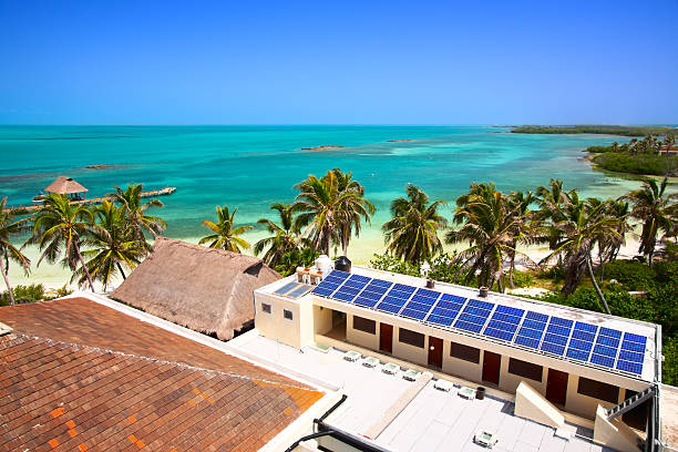 building with a solar panel on the Isla Contoy, Mexico birdeye view on the beach with a building with a solar panel on the Isla Contoy, Mexico contoy island photos stock pictures, royalty-free photos & images