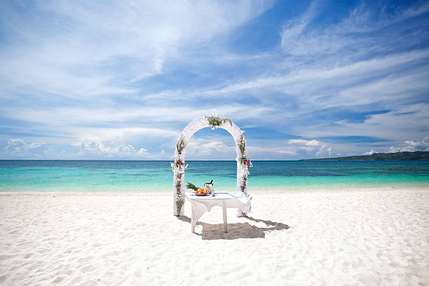 istock Beautiful wedding arch on tropical beach 475084087