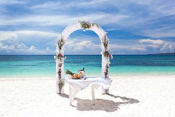 istock Beautiful wedding arch on tropical beach 475084487