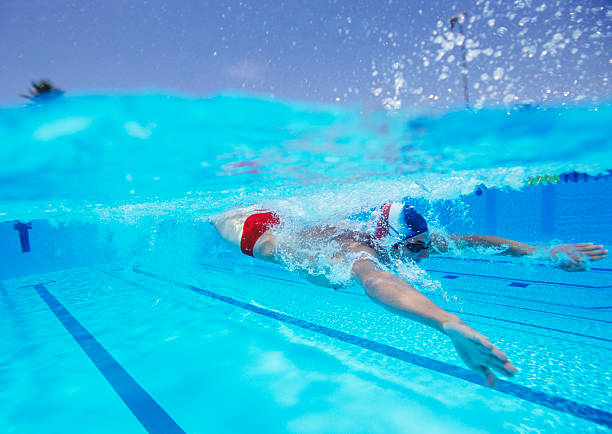 istock Professional male athlete swimming in pool 475085175