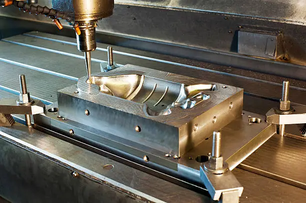 Industrial metal mold milling. Metalworking. CNC industry