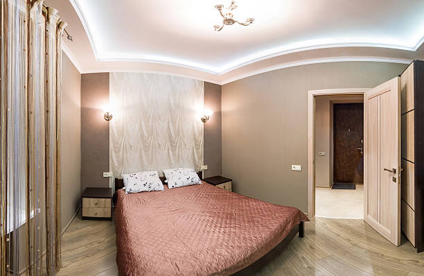istock Panorama hotel room. Small bedroom with double bed 475086512