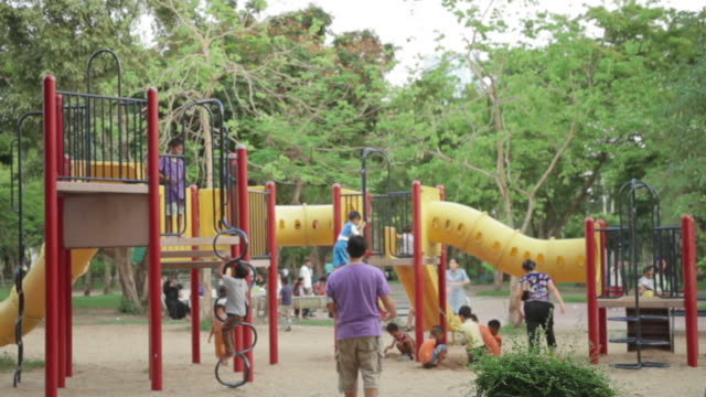kids and parents at park playground