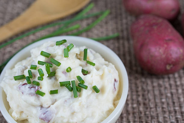istock Homemade mashed potatoes and chives sprinkled on top. 475089624