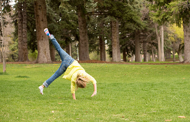 istock Young girl in park. 475090076