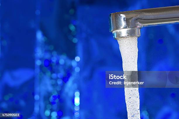 Water Flowing From The Tap Stock Photo - Download Image Now - Backgrounds, Bathroom, Blue