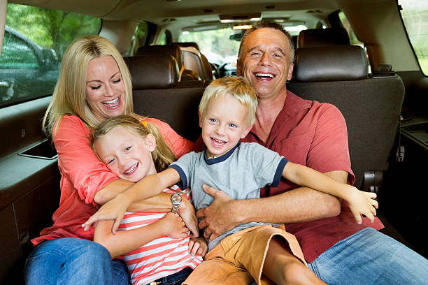 istock Family in back of van. 475090624