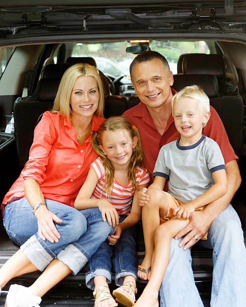 istock Family in back of van. 475090736