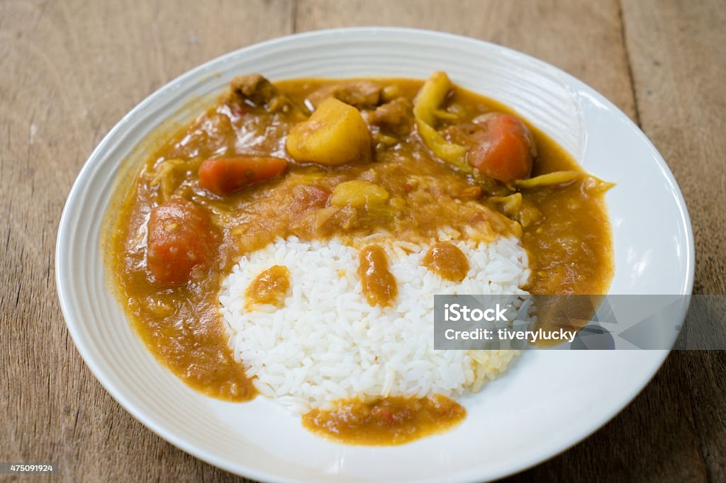 pork in curry sauce pork in curry sauce and rice on a plate 2015 Stock Photo