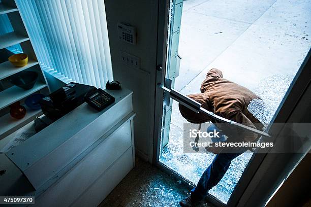 Robber Using A Sledgehammer Stock Photo - Download Image Now - Thief, Stealing - Crime, Burglary