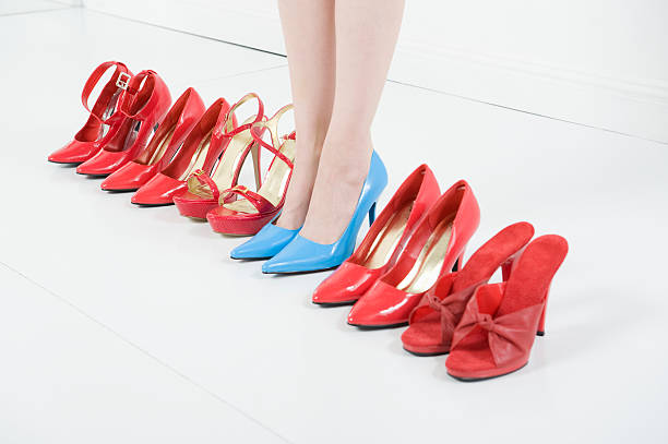 istock Woman Standing In Blue High Heels 475098135