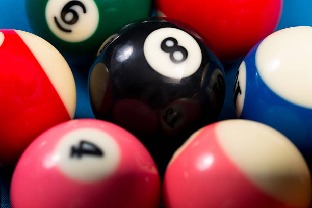 istock Close-Up Of Pool Balls On Blue Table 475098841