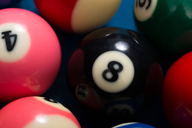 istock Close-Up Of Pool Balls On Blue Table 475098907