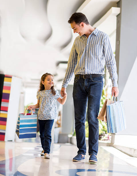 istock Father shopping with his daughter 475099250